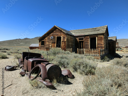 Abandoned wooden farmhouse in ghost town Bodie, California - landscape photo