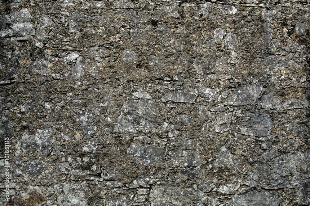Grey textured stone wall without vignette effect