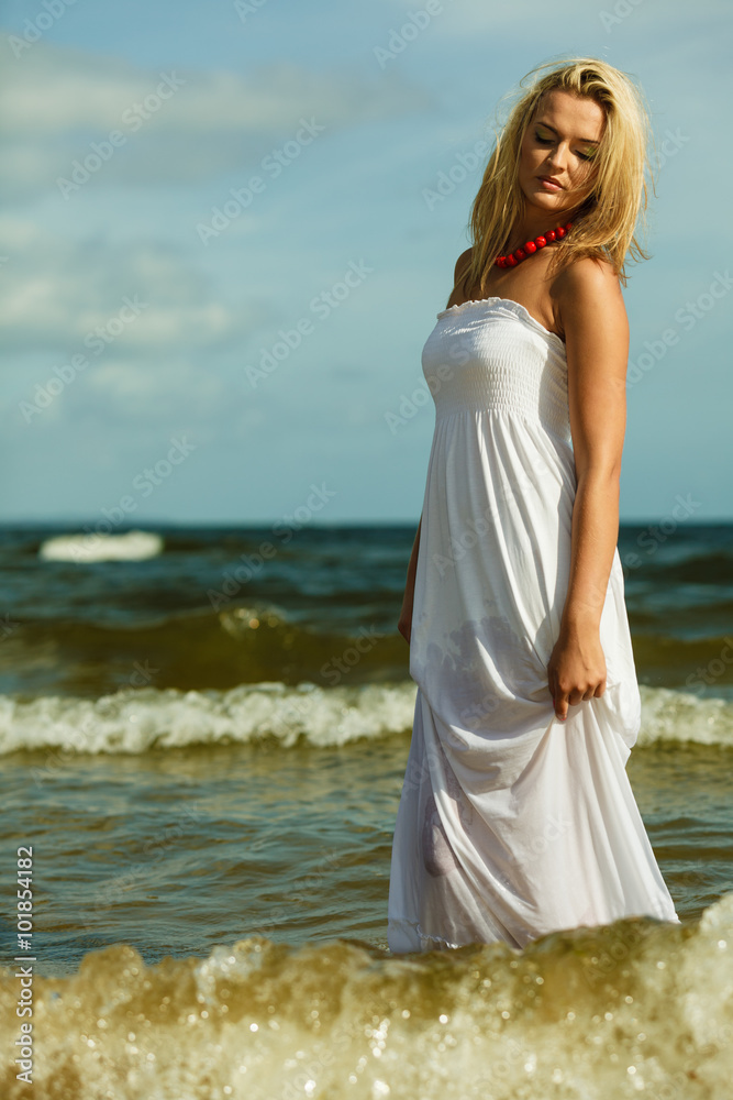 Beautiful blonde girl on beach, summertime Beautiful blonde girl on beach, summertime