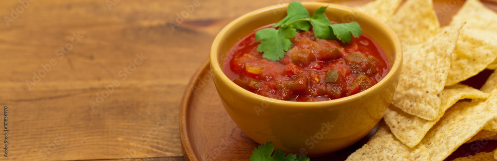 Chunky Salsa and tortilla chips. Selective focus. Chunky Salsa and tortilla chips. Selective focus.