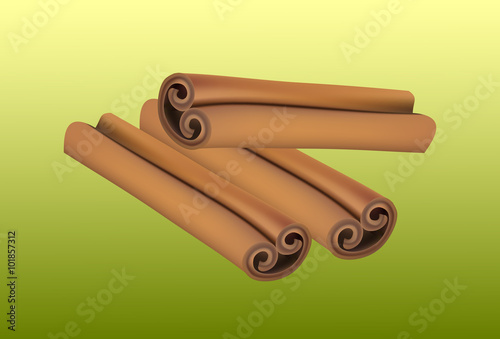 Fragrant cinnamon sticks isolated on green background