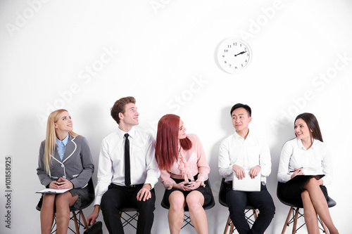 Young people sitting on a c...
