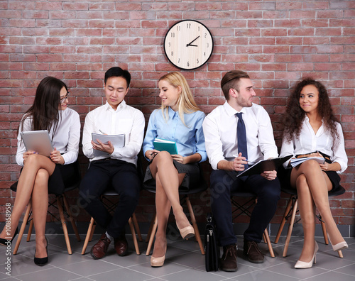 Young people sitting on a c...