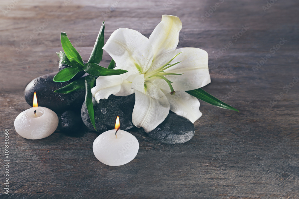 Behang Spa still life with beautiful flower and candlelight on wooden background
