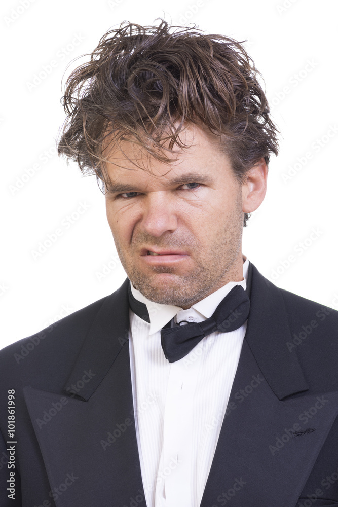 Fotografie Deranged angry man in a tuxedo