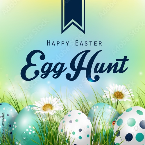 Beautiful Easter blue green Background with flowers and colorful eggs in the grass 