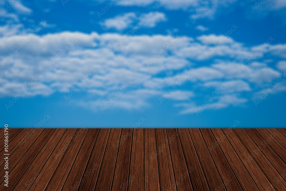 Empty wooden table and beautiful summer sky in background. Great