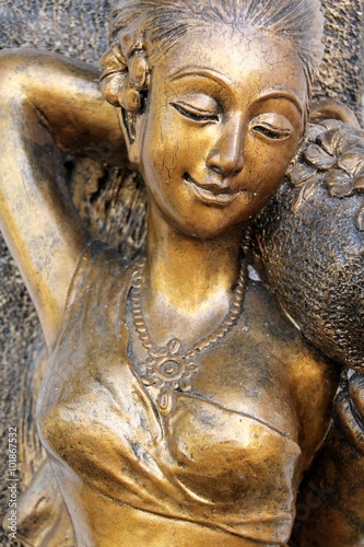 Golden thai thai woman statue