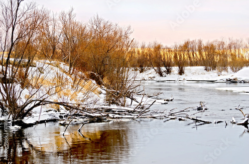 River and snowy waterside