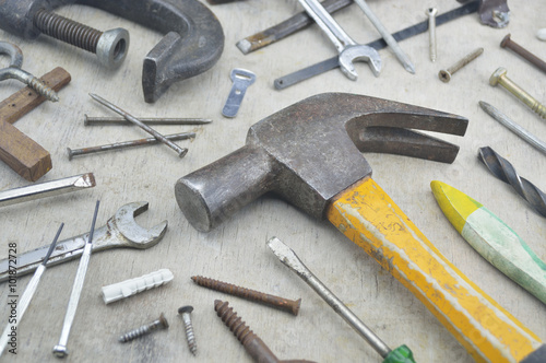 Assorted old work tools on wooden