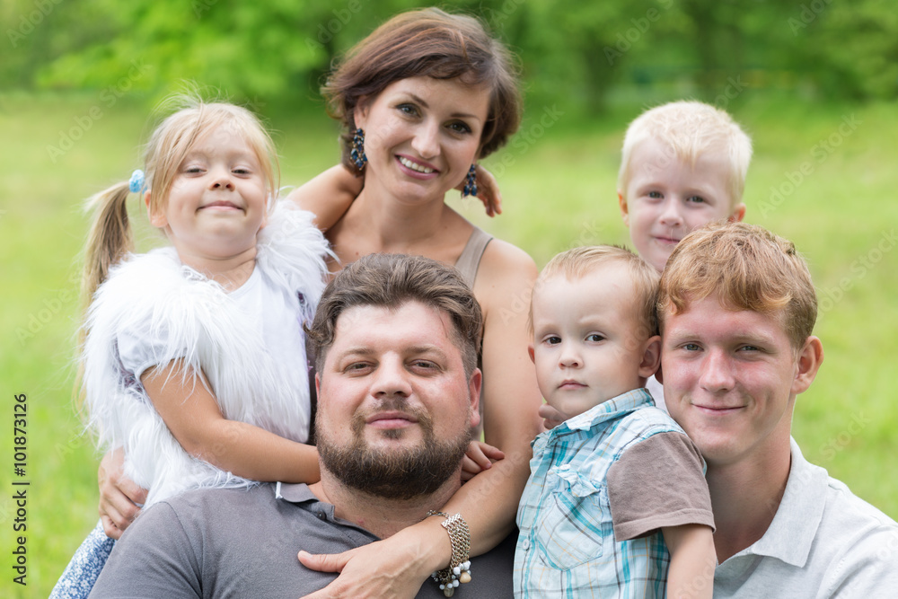 Parents with four children in a park Parents with four children in a park