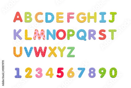 Colorful paper alphabet magnets on a whiteboard. Letters set iso