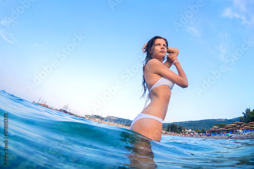 attractive woman sunbathing at tropical resort