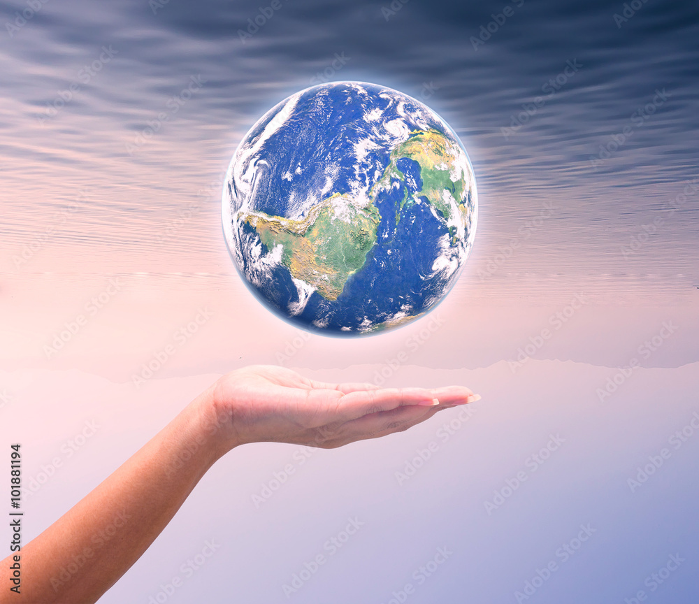 Human hand holding Earth planet. Elements of this image are furn Human hand holding Earth planet. Elements of this image are furn