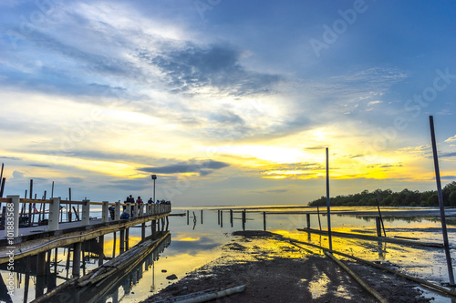 Jetty silhouette with sunset background