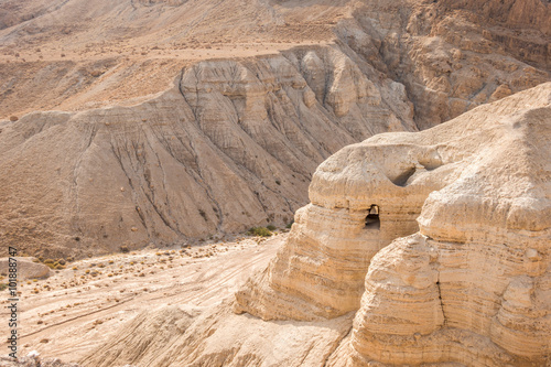 Cave in Qumran, where the dead sea scrolls were found photo