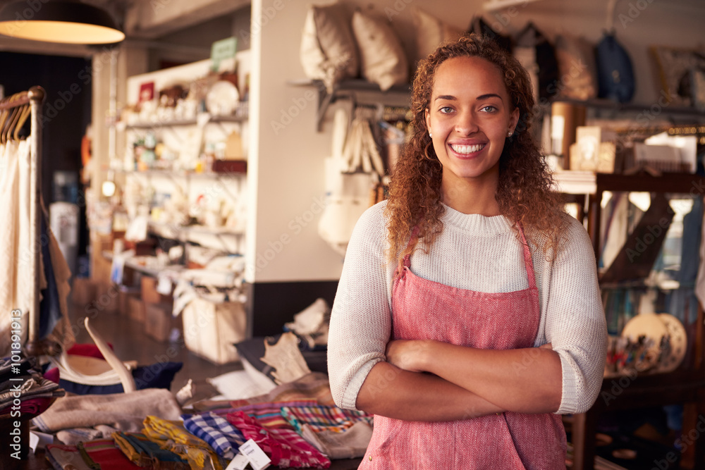 Fototapeta premium Portrait Of Female Owner Standing In Gift Store