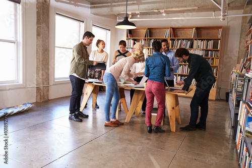 Business Team Meeting Around Table For Brainstorming Session