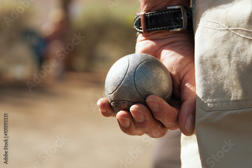 Senior playing petanque,fun and relaxing game photo