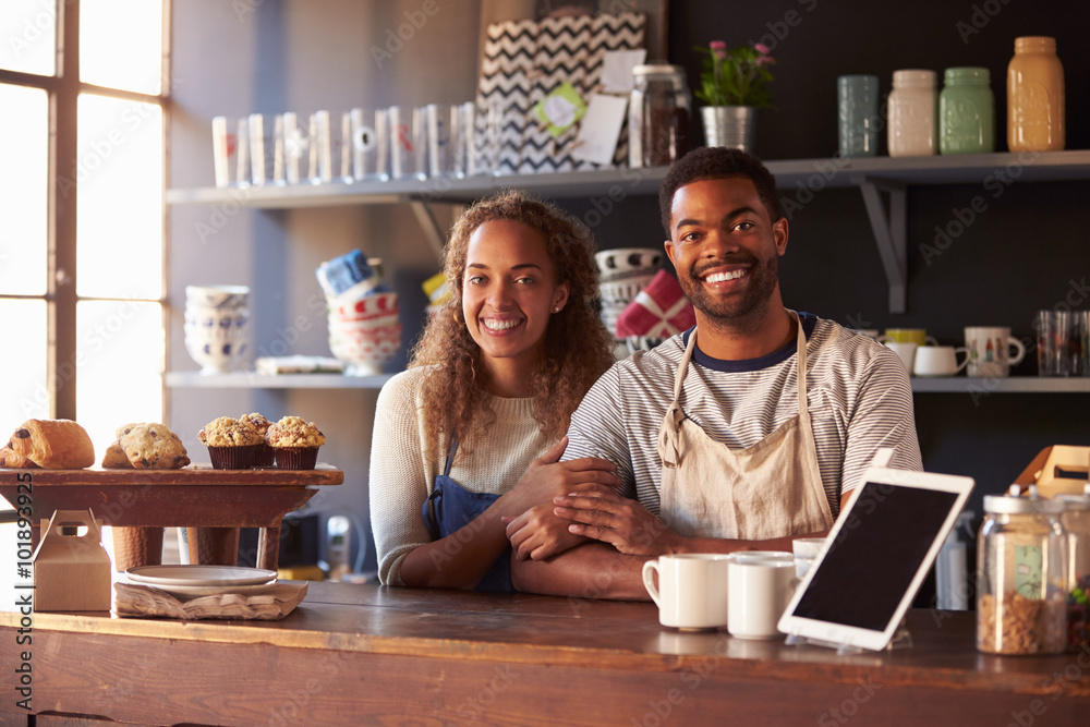Portrait Of Couple Running Coffee Shop Behind Counter Portrait Of Couple Running Coffee Shop Behind Counter