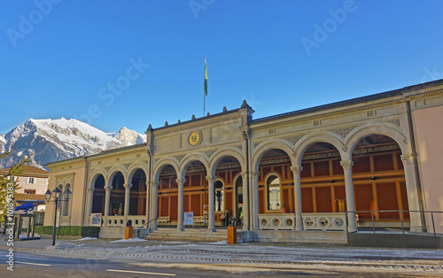 Mountains and Spa house with Cat statue of Bad Ragaz