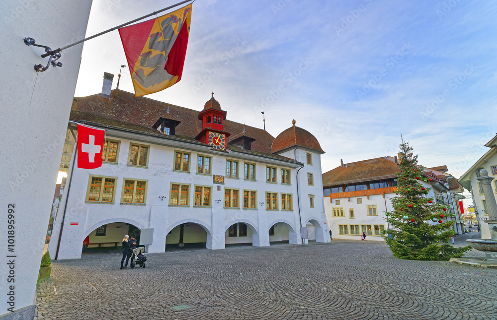 City Hall and Christmas tree and flag in Thun Square