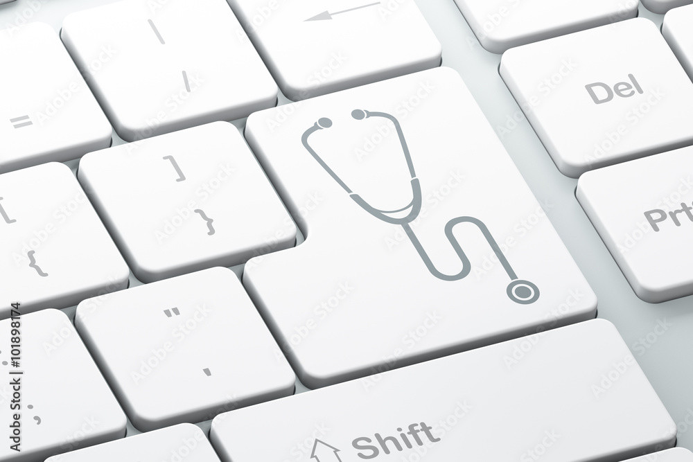 Healthcare concept: Stethoscope on computer keyboard background Healthcare concept: Stethoscope on computer keyboard background