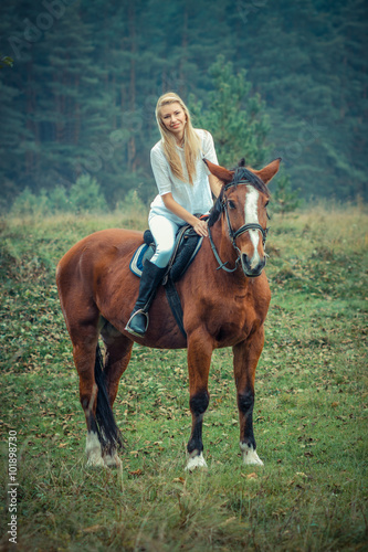romantic sensual girl  on a horse in the forest © ruslimonchyk