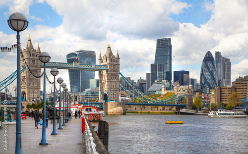 LONDON, UK - APRIL 30, 2015: Tower bridge and City of London financial aria on the background. View includes Gherkin and other buildings