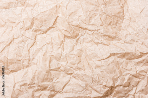 Brown crumpled paper background.