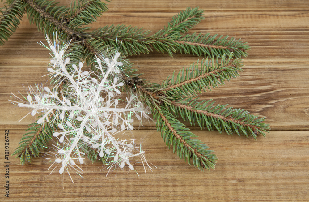 branch of Christmas tree and snowflake branch of Christmas tree and snowflake