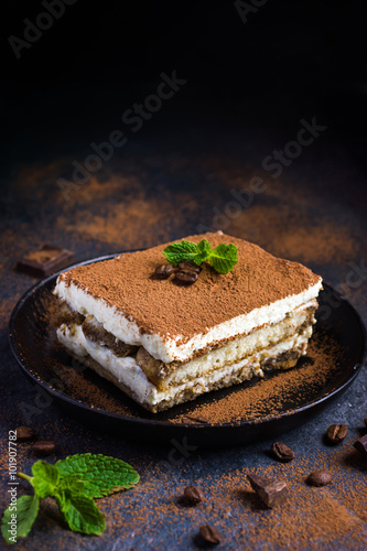Traditional italian dessert tiramisu on blake plate