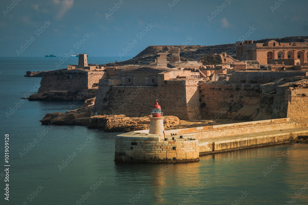 The lighthouse in Grand Harbour. Valletta, Malta