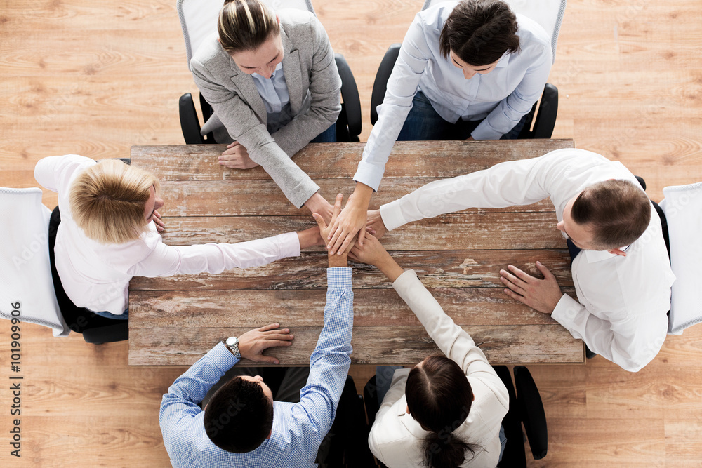 Ταπετσαρία close up of business team with hands on top