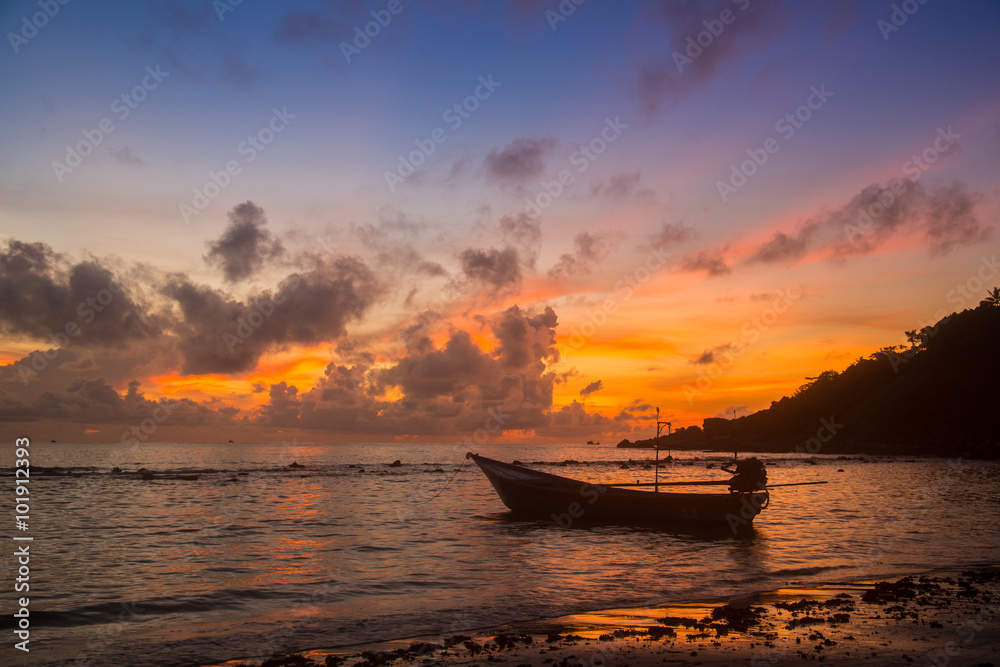 A boat in sea during sunrise A boat in sea during sunrise