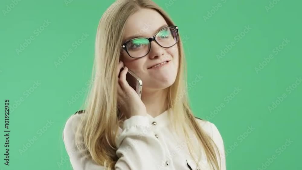 Business woman speaks on the phone green screen Business woman speaks on the phone green screen