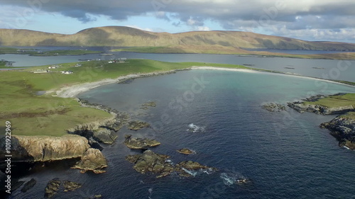 Dramatic aerial shot off the coast of Shetland, Scotland
 photo