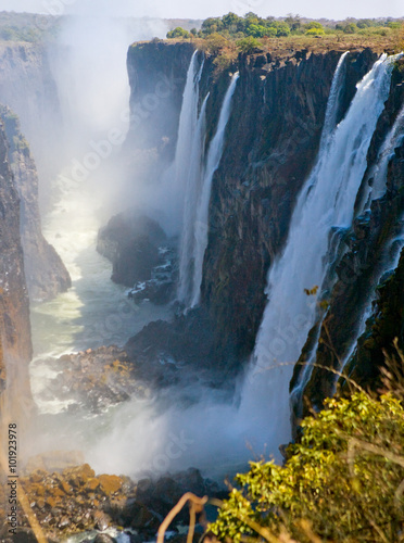 Fototapeta View of Victoria Falls from the ground. Mosi-oa-Tunya National park. and World Heritage Site.  Zambiya. Zimbabwe. An excellent illustration.