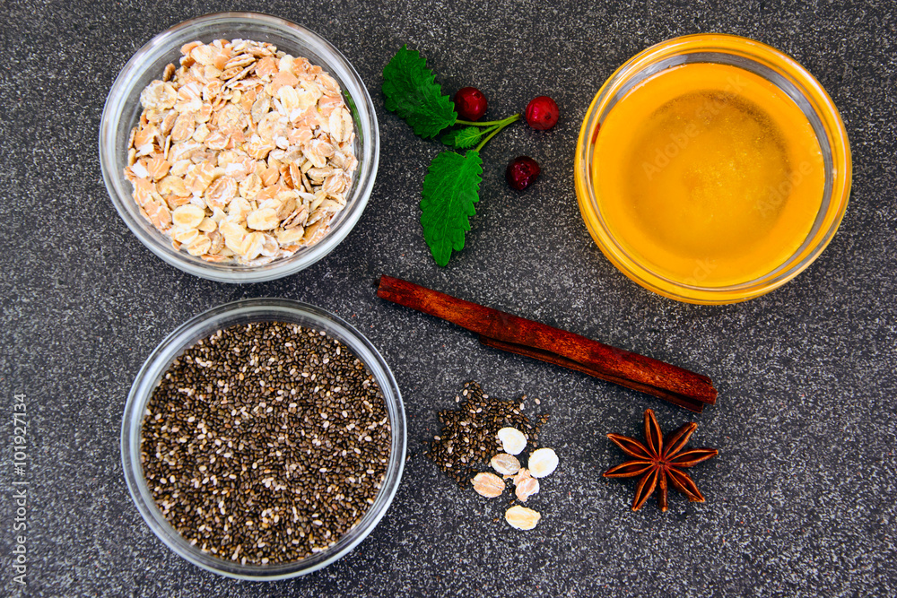 Chia Seeds, Oatmeal, Honey in Glass Bowl Chia Seeds, Oatmeal, Honey in Glass Bowl