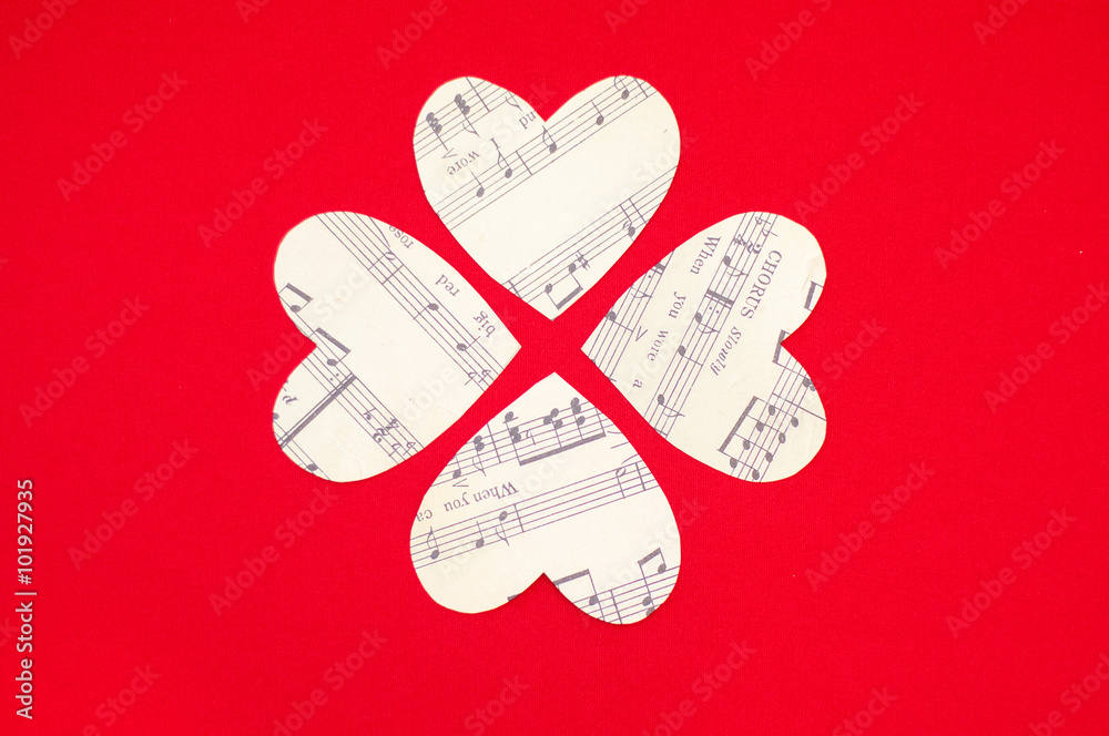 Four paper heart on red background Four paper heart on red background