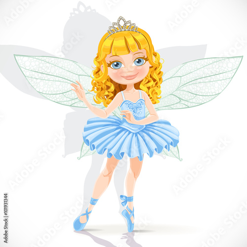 Beautiful little fairy girl in tiara and blue dress isolated on