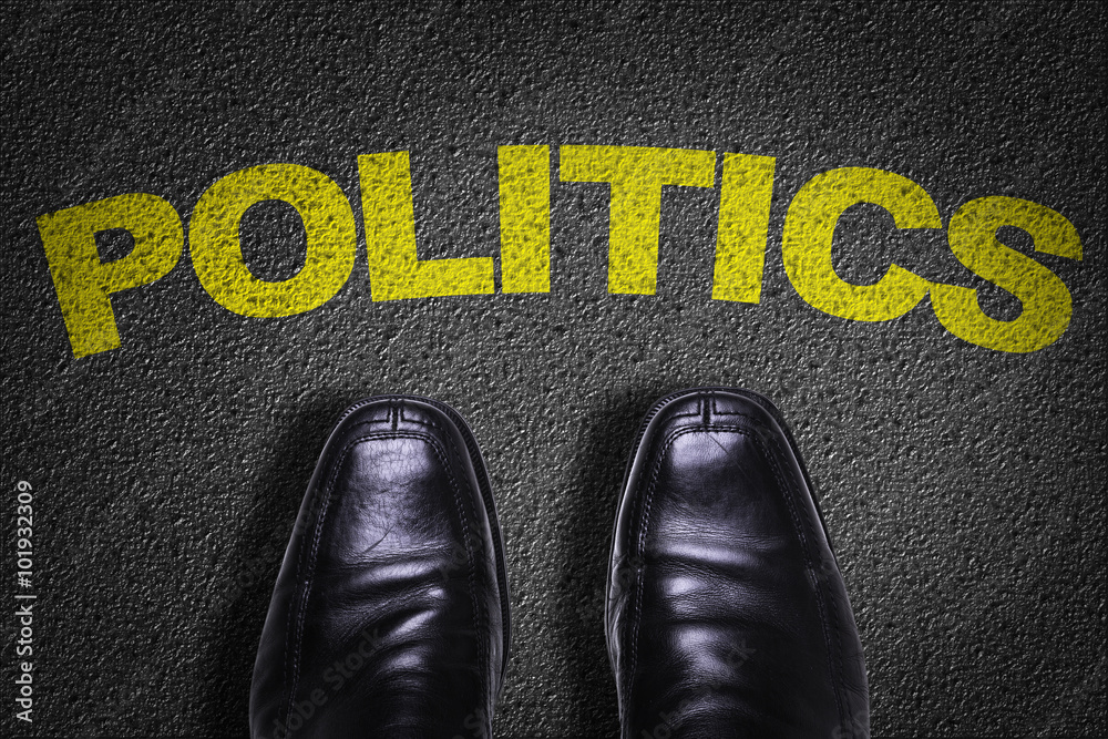 Φωτογραφία Top View of Business Shoes on the floor with the text: Politics