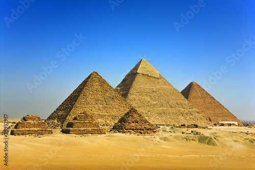 Egypt. Cairo - Giza. General view of pyramids from the Giza Plateau (on front side: 3 pyramids popularly known as Queens' Pyramids; next: the Pyramid of Mykerinos, Chephren and Cheops) 