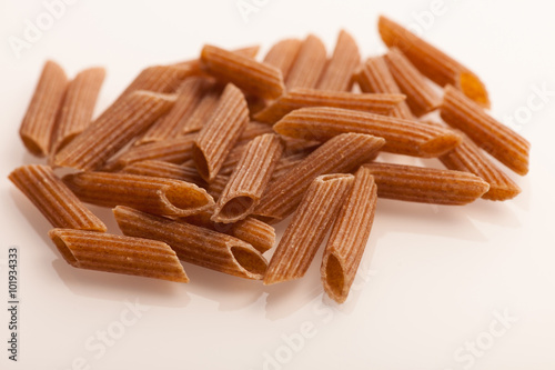 Bunch of pasta made of buckwheat flour isolated over white backg