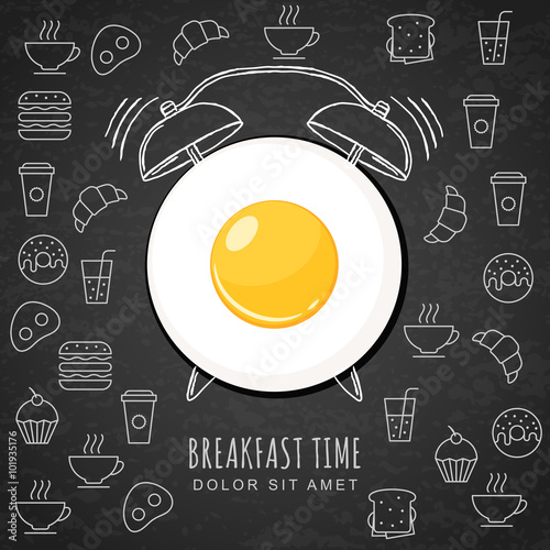 Fried egg and hand drawn watercolor alarm clock on textured blac