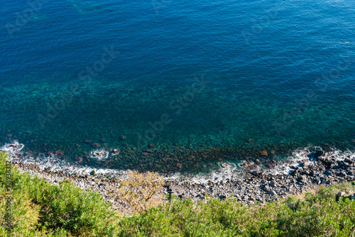 Quadro su tela Aerial view of the coastline below the Timpa, near Catania (eastern Sicily)