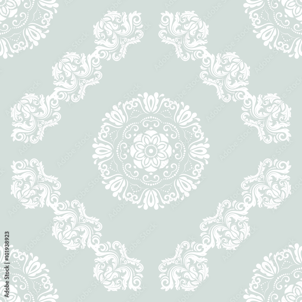 Damask seamless ornament. Traditional light blue and white pattern. Classic oriental background
