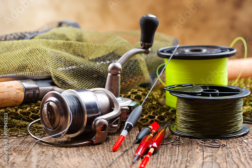 fishing tackle on a wooden table