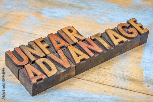 Fotografija unfair advantage in wood type