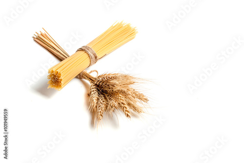 flour and wheat as the main ingredients for making spaghetti, isolated on white